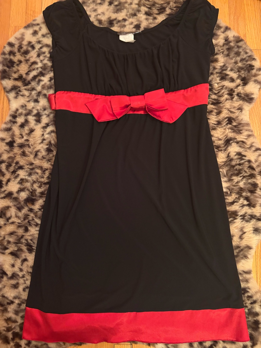 black babydoll dress with red satin bows